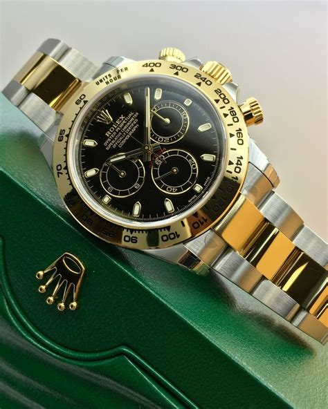 rolex daytona steel and gold grey dial|rolex daytona black dial price.